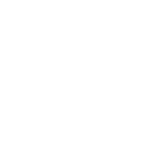 Icon of a person sitting at a desk with a computer, representing business and IT services.